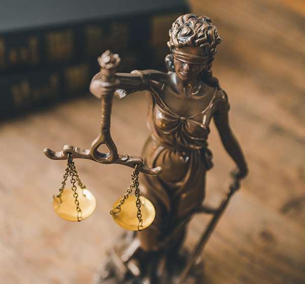 justice statue on table