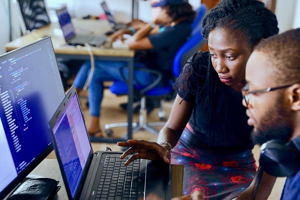 women looking at computer